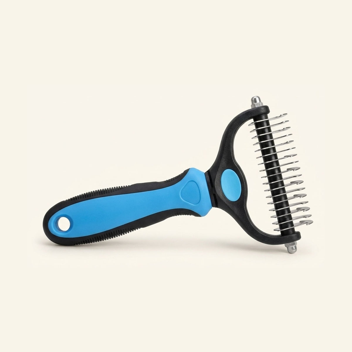 Blue and black double-sided dematting and deshedding brush for pet grooming.