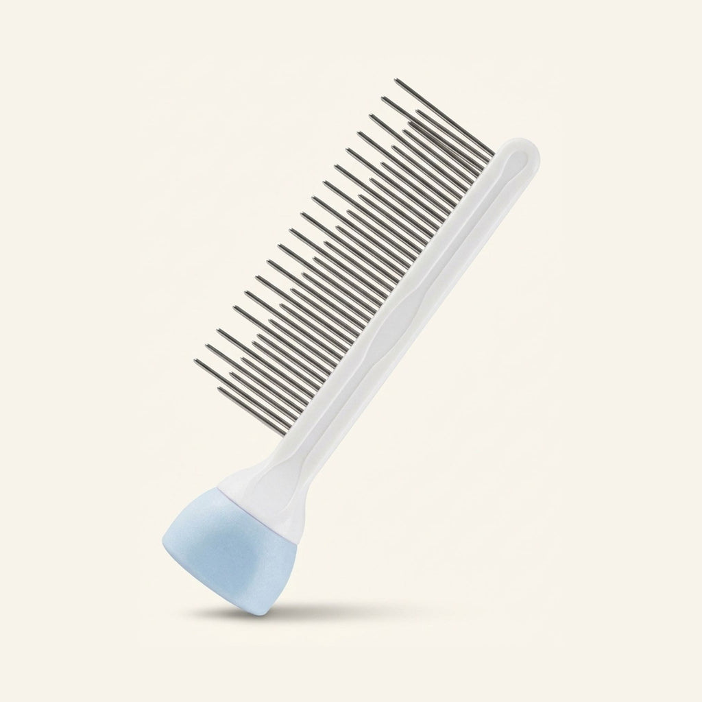 A white grooming comb with long and short metal teeth and a light blue handle end.